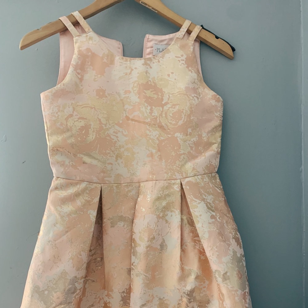 Peachy-pink kids dress.
